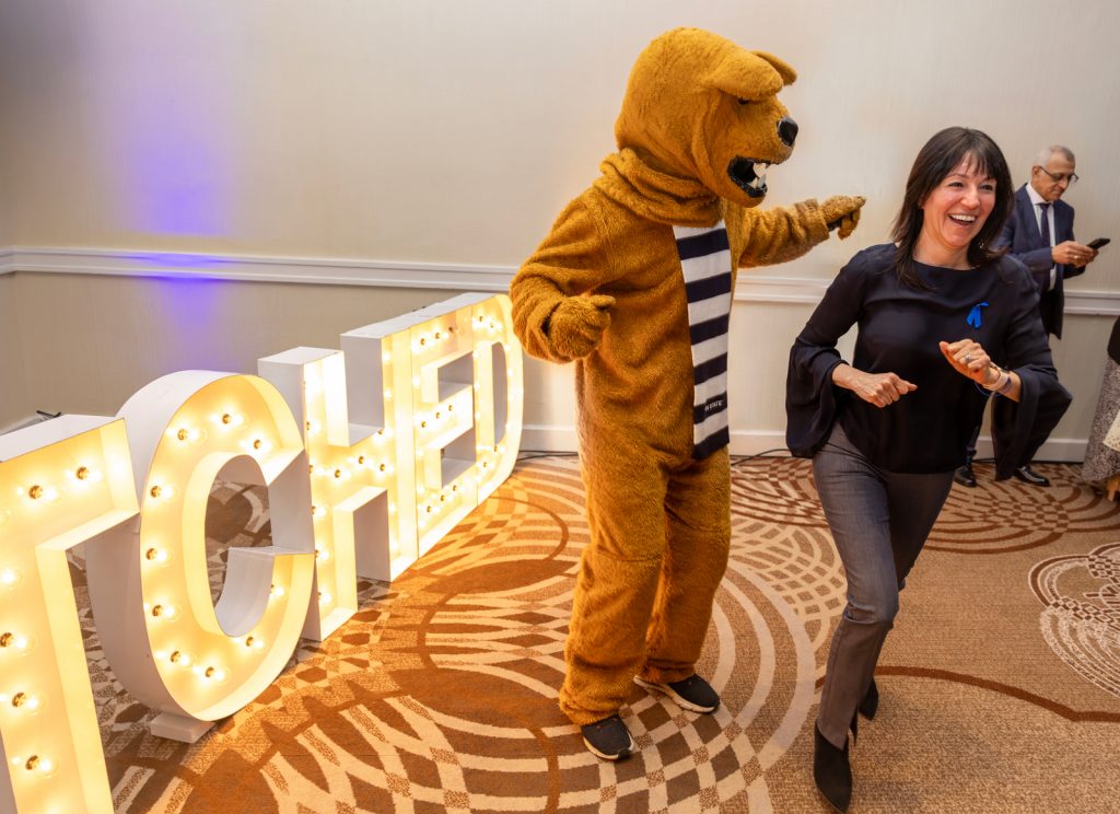 Merris Groff dances with the Penn State Nittany Lion mascot